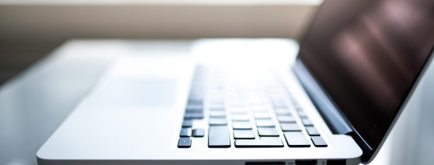 shallow-focus-photography-of-macbook