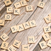 scrabble-letters-spelling-saas-on-a-wooden-tabl