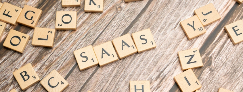 scrabble-letters-spelling-saas-on-a-wooden-tabl